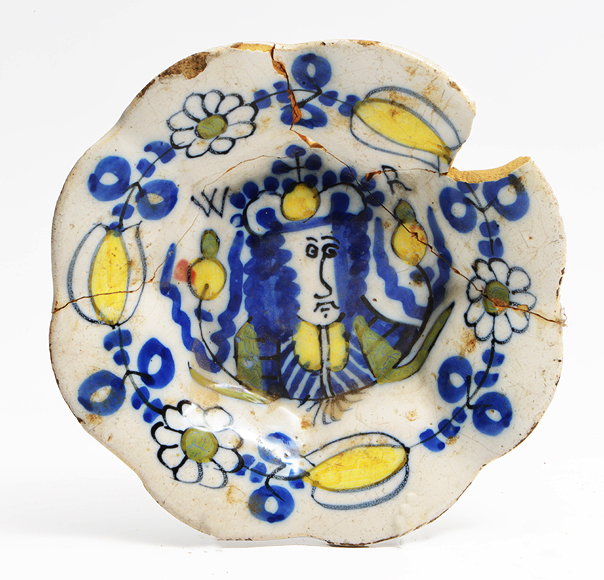 Appraisal: A SMALL LATE TH CENTURY MOULDED DUTCH DELFTWARE DISH painted