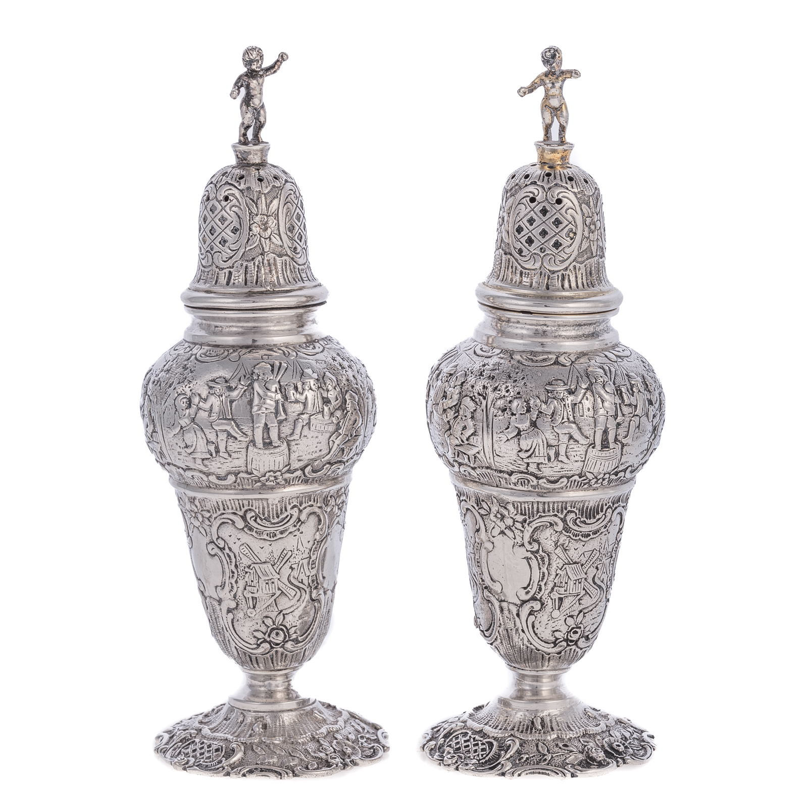 Appraisal: A PAIR OF GERMAN SILVER REPOUSSE SUGAR CASTERS Late th-early