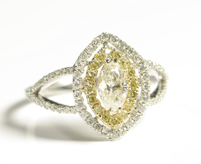 Appraisal: DIAMOND AND FOURTEEN KARAT GOLD RING with appraisal The white