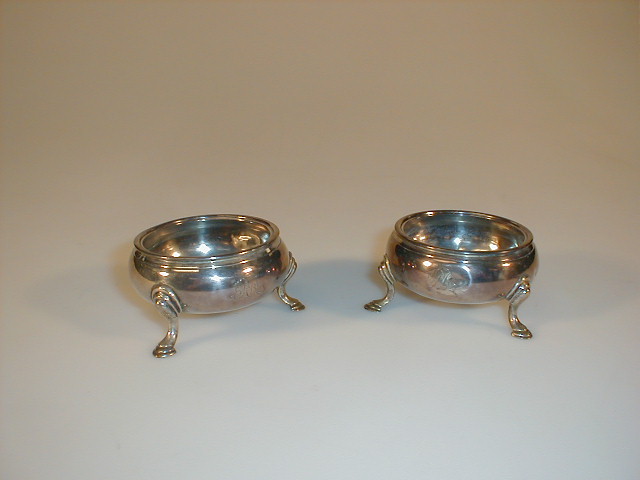 Appraisal: A pair of George III silver salts of compressed circular