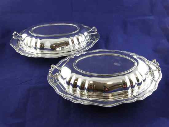 Appraisal: A pair of th century Peruvian sterling silver two handled