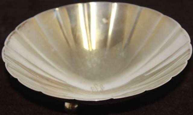 Appraisal: TIFFANY STERLING SILVER FOOTED BOWL WITH RIBBEDDESIGN MONOGRAM IN CENTER