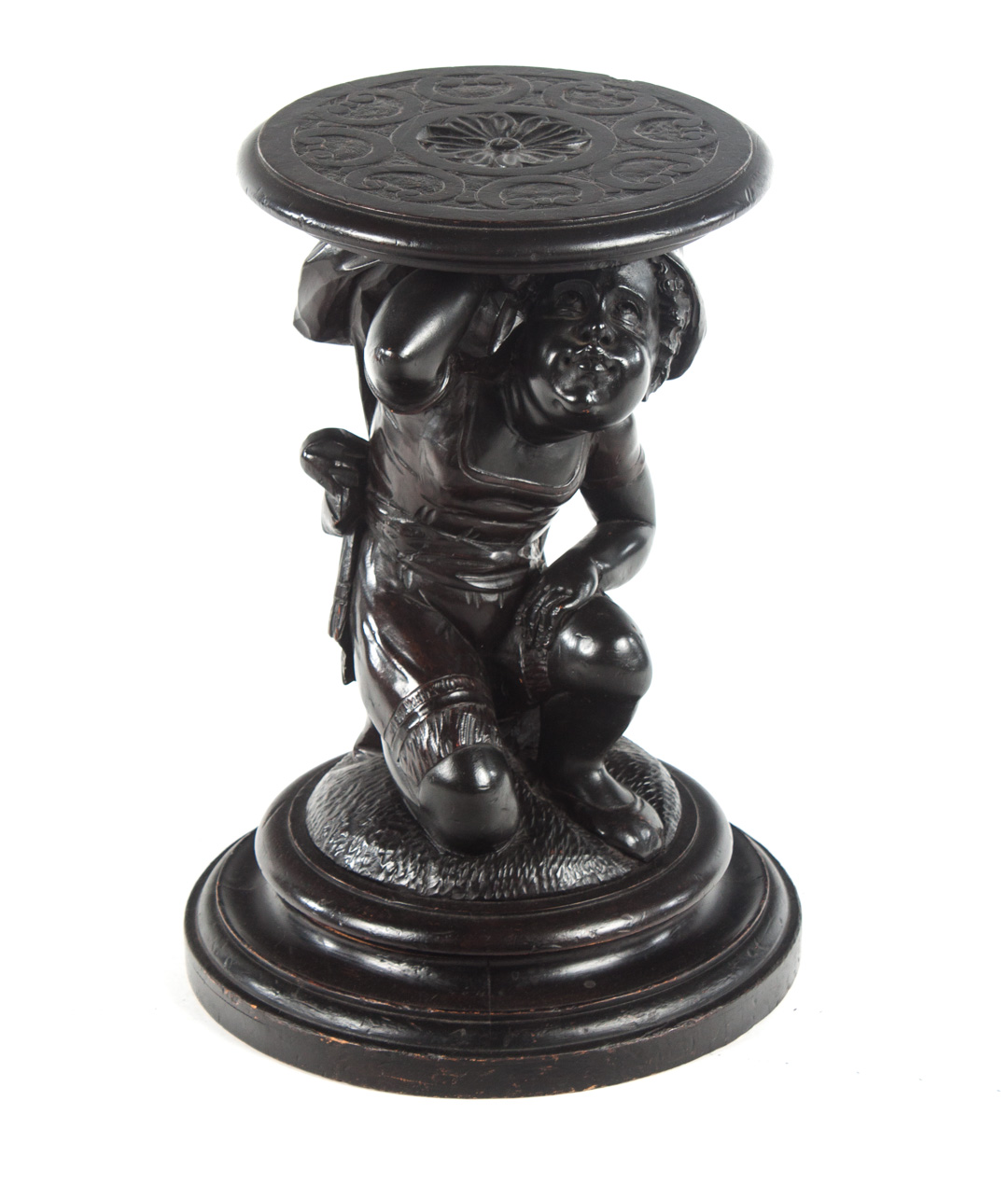 Appraisal: Continental carved wood blackamoor stand modeled as crouching blackamoor youth