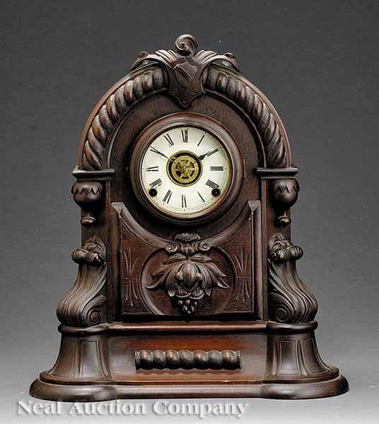 Appraisal: An American Carved Walnut Mantel Clock c domed top with