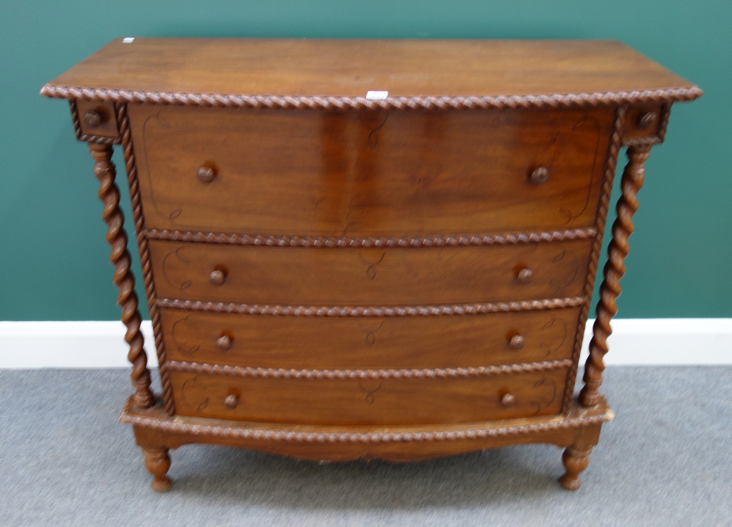 Appraisal: A Colonial hardwood bowfront secretaire chest the fitted drawer over