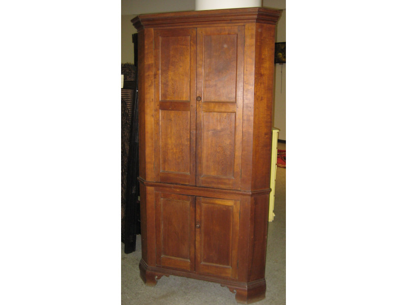 Appraisal: AMERICAN TH CENTURY WALNUT CORNER CUPBOARD Molded cornice is over