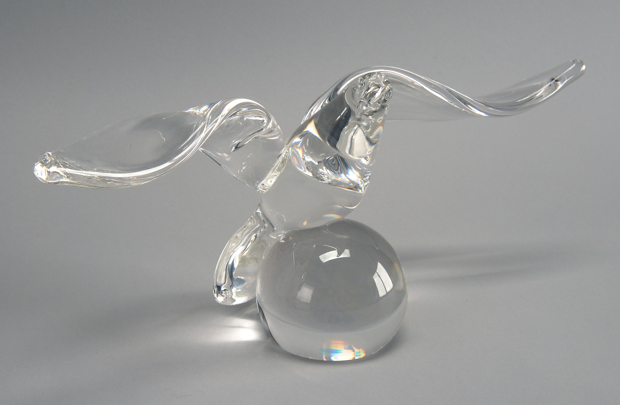 Appraisal: TH CENTURY STEUBEN GLASS EAGLE FIGURE perched on a globe