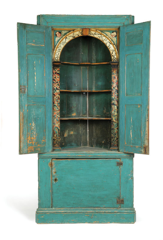 Appraisal: DECORATED CORNER CUPBOARD American or English late th century pine