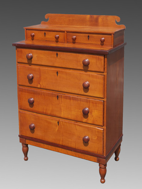 Appraisal: MIXED WOOD GENTLEMEN'S CHEST OF DRAWERS Shaped gallery over half