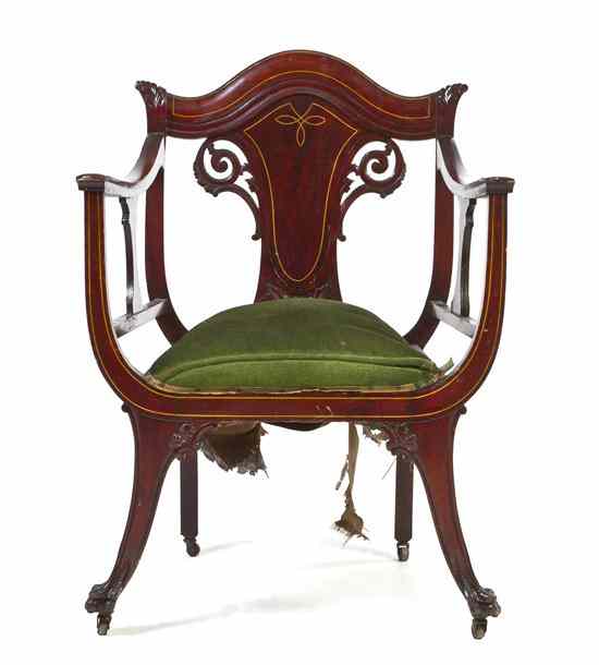 Appraisal: An Edwardian Open Armchair having a pierce carved and inlaid