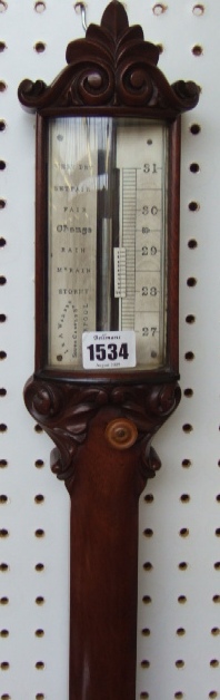 Appraisal: A Victorian carved walnut marine stick barometer by I A