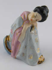 Appraisal: A Soviet Latvian figure of a lady in oriental dress