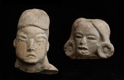 Appraisal: TWO PRE-COLUMBIAN HEADS One olmecoid-style the other with large ear