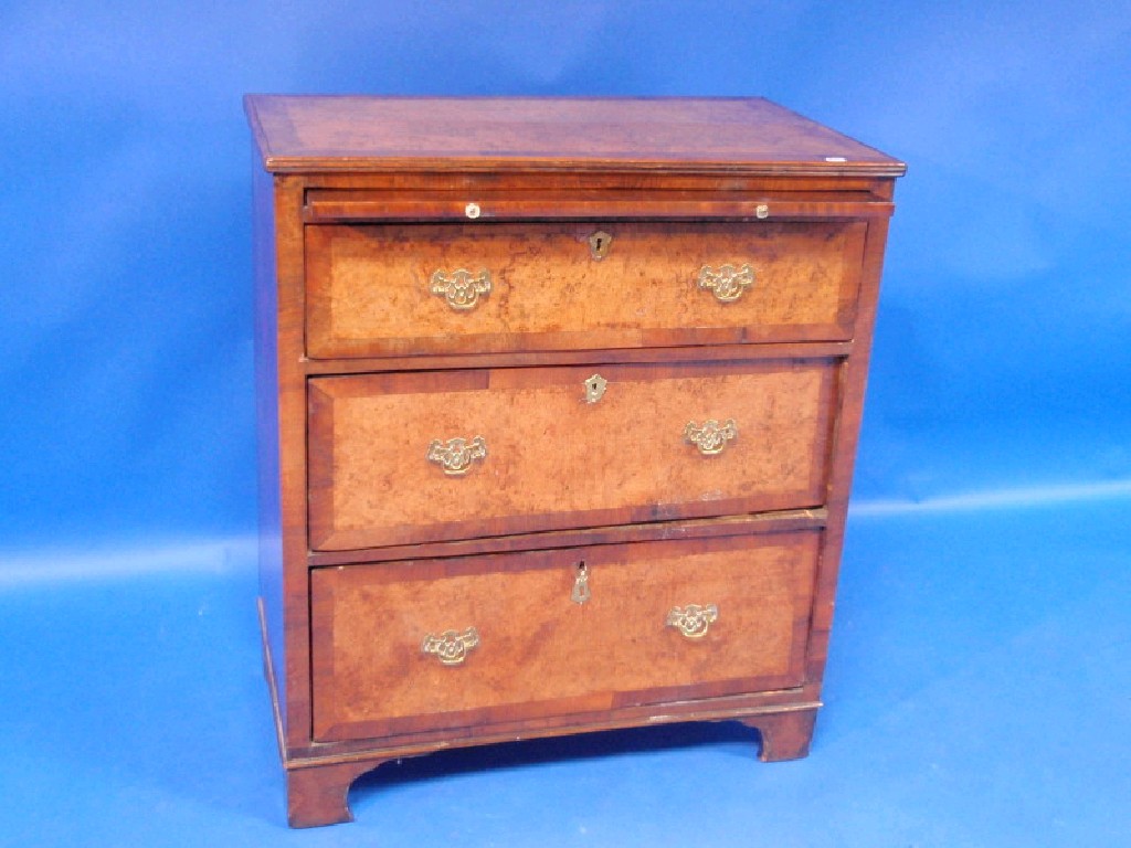 Appraisal: An early thC walnut gentleman's chest with cross banded borders