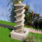 Appraisal: An Indonesian carved stone 'Meander' Water Feature ft H