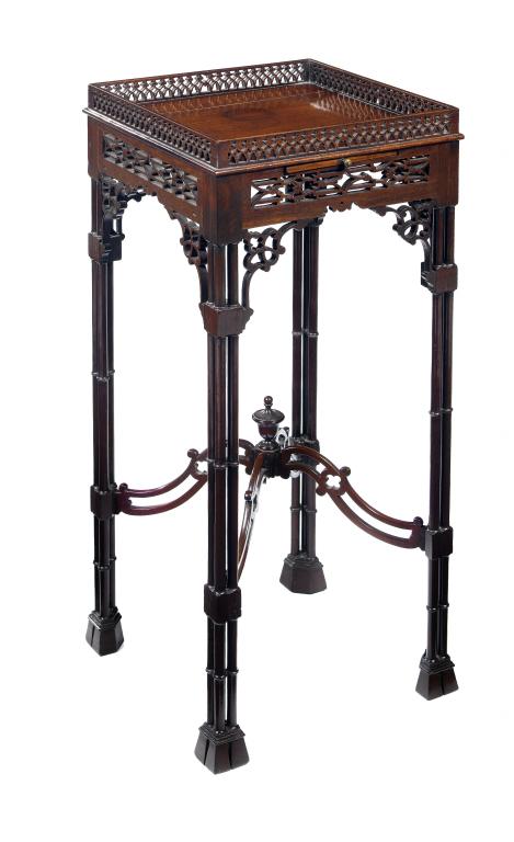 Appraisal: A GEORGE III MAHOGANY URN-STAND with fretwork gallery and frieze