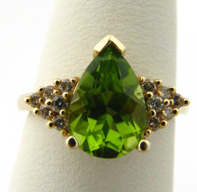 Appraisal: K yellow gold Pear shaped tourmaline ring with six diamond