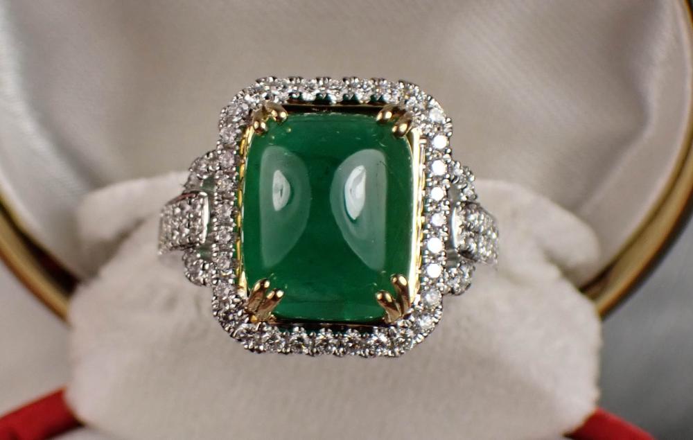 Appraisal: EMERALD DIAMOND AND FOURTEEN KARAT GOLD RING The k white