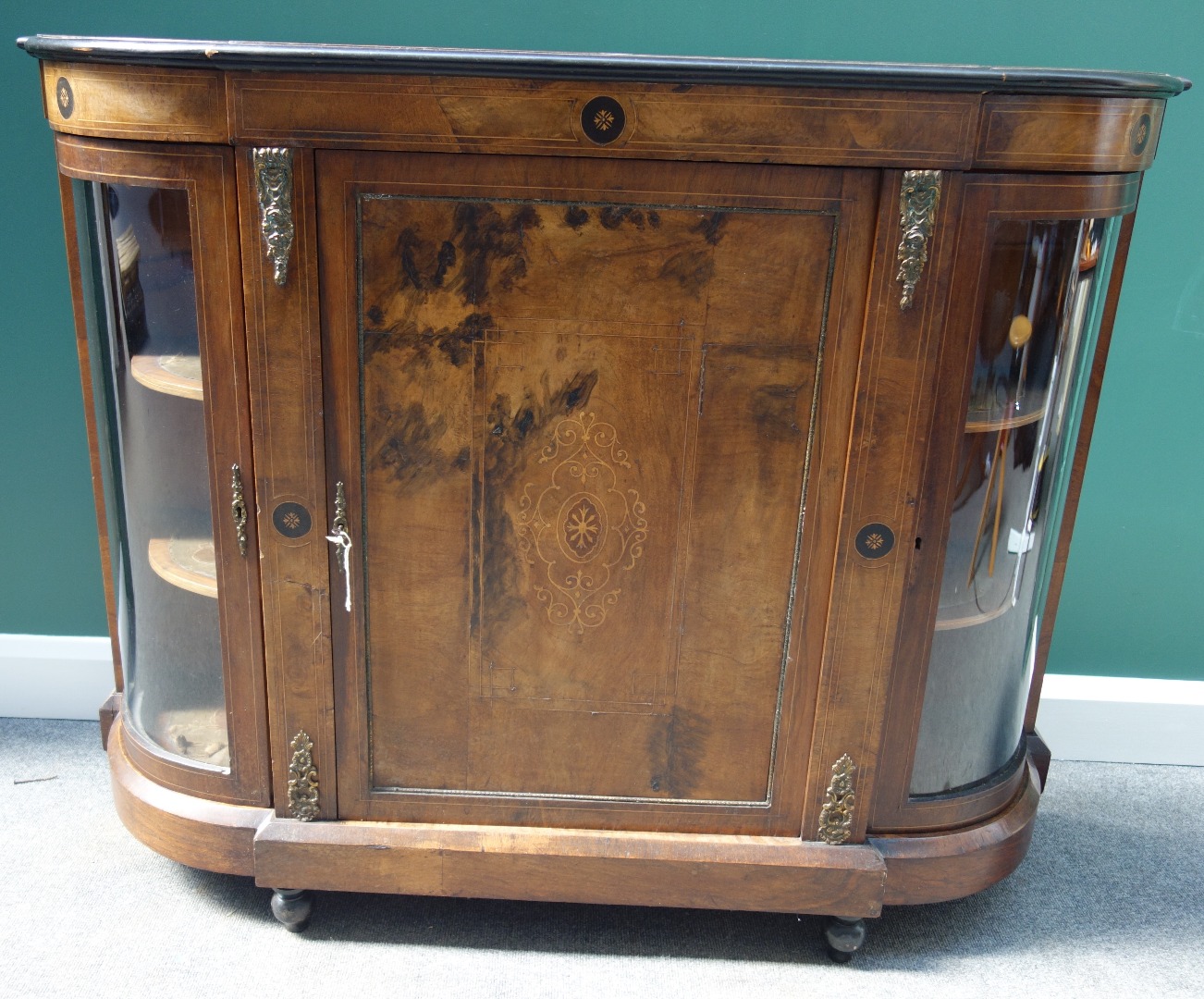 Appraisal: A Victorian marquetry inlaid gilt metal mounted figured walnut credenza