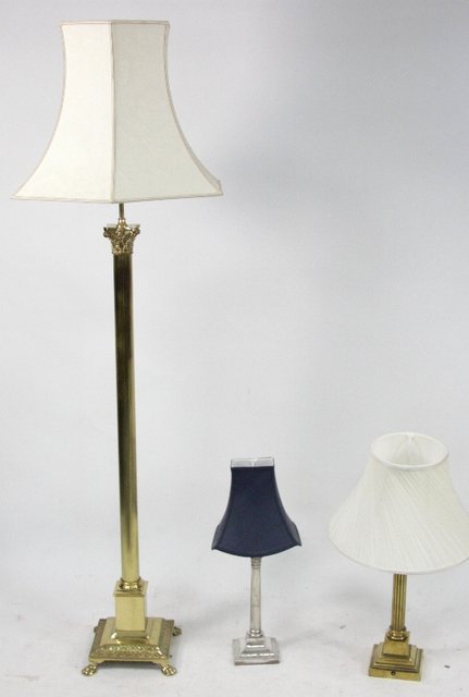 Appraisal: A brass standard lamp and two other lamps fitted for