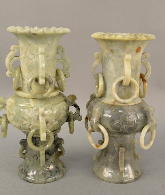 Appraisal: Pair of hardstone ring vases each having eight carved handles