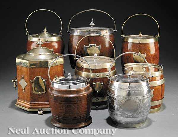 Appraisal: A Group of Seven Antique English Oak Barrel-Form Biscuit Boxes