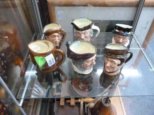 Appraisal: A COLLECTION OF SIX ROYAL DOULTON MINIATURE CHARACTER JUGS consisting