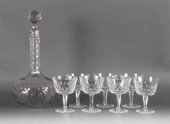 Appraisal: American glass decanter in the ''Thumbprint'' pattern and seven Waterford