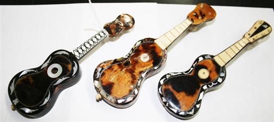 Appraisal: Miniature tortoise guitars th century inlaid with mother-of-pearl and ivory