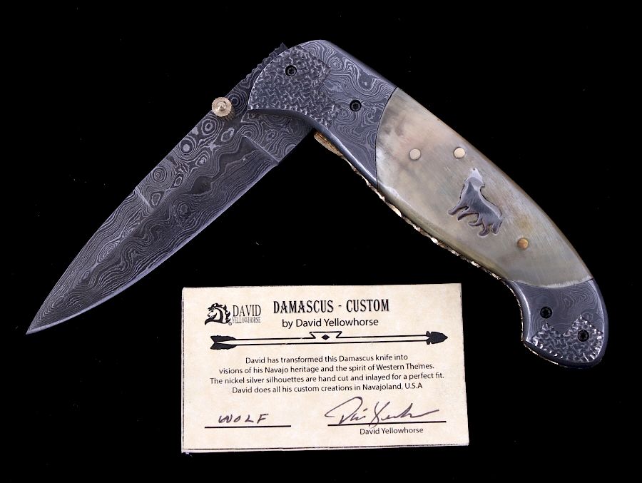 Appraisal: Navajo Dave Yellowhorse Damascus Silver Wolf Knife We are proud