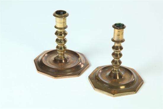 Appraisal: TWO BRASS CANDLESTICKS Continental th century Similar with knop stems