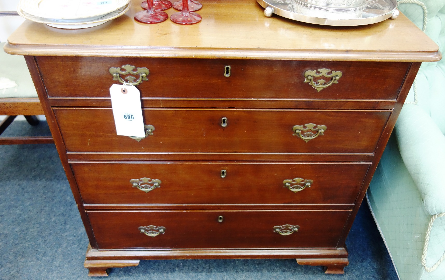 Appraisal: A George III mahogany chest the associated moulded edge top