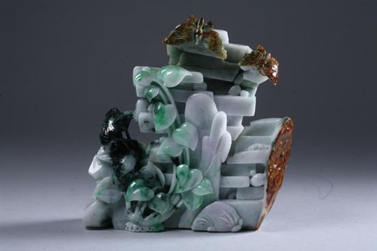 Appraisal: CHINESE WHITE APPLE GREEN AND RUSSET JADEITE CARVING Butterfly rockery