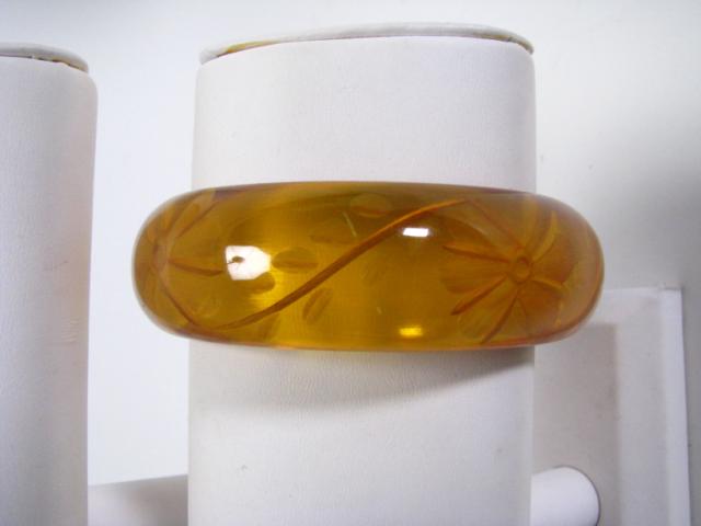 Appraisal: Reverse cut floral design clear bakelite bangle bracelet excellent condition