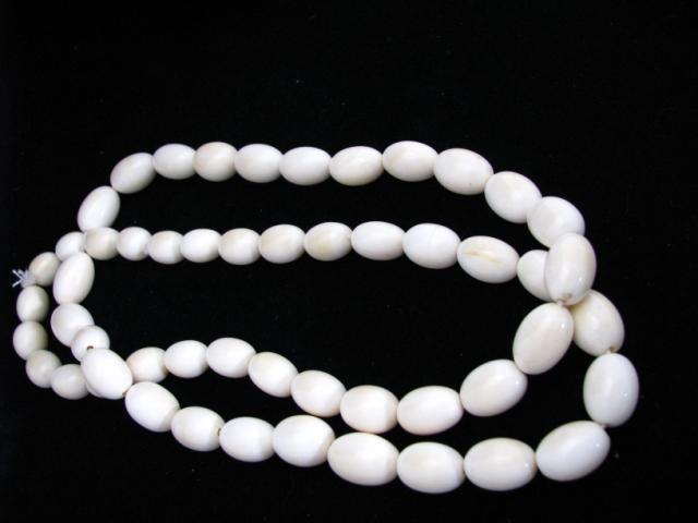 Appraisal: Hand carved strung ivory beads total length