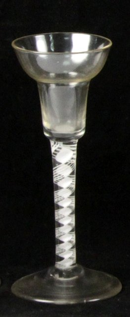 Appraisal: An th Century cordial glass with plain baluster shaped bowl