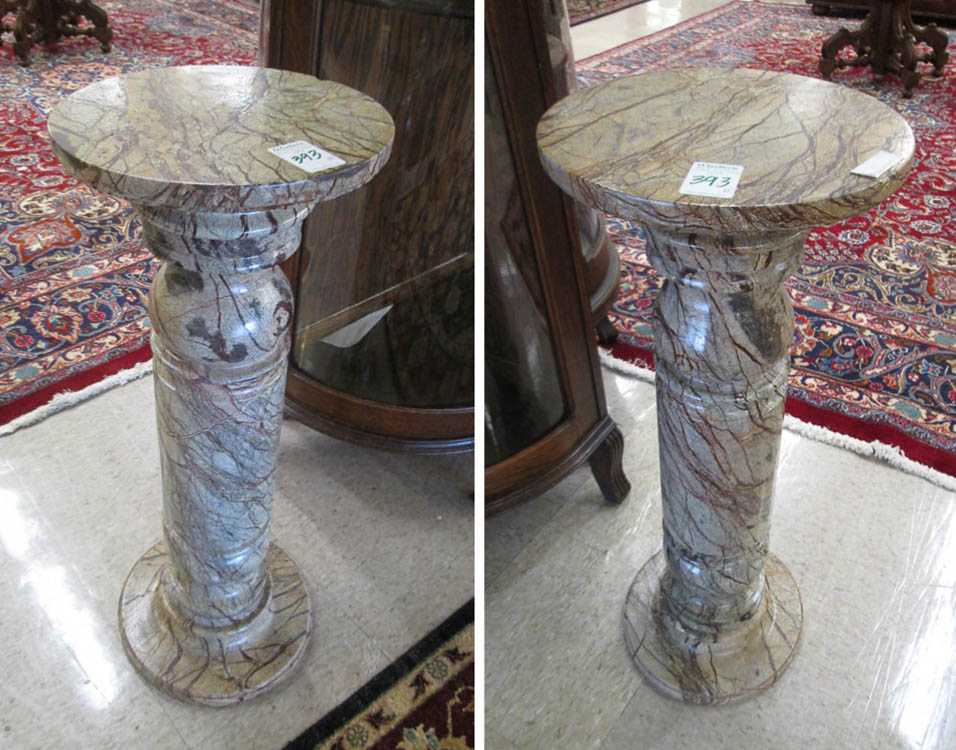 Appraisal: PAIR OF MARBLE PEDESTALS Italian Rosa Atlantide marble including round