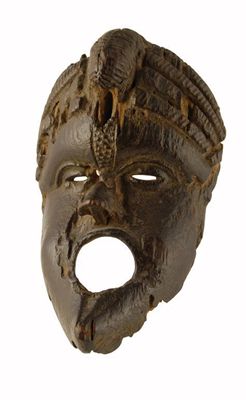 Appraisal: A Bassa mask with circular mouth aperture and coffee bean