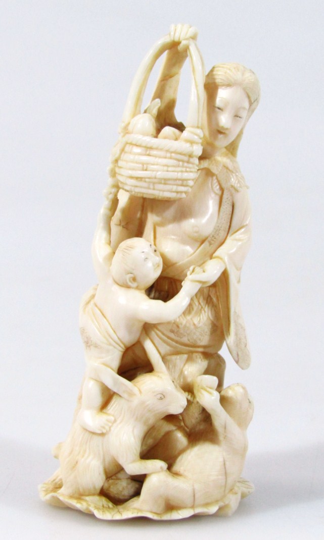 Appraisal: An early thC ivory figure of a lady in flowing