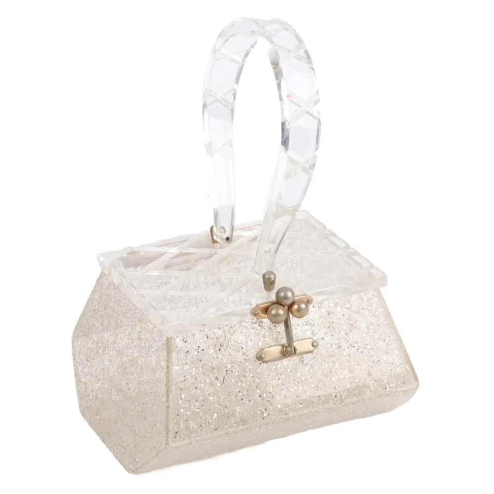 Appraisal: LUCITE HANDBAG WITH SILVER AND GOLD CONFETTI BODY AND DEEPLY