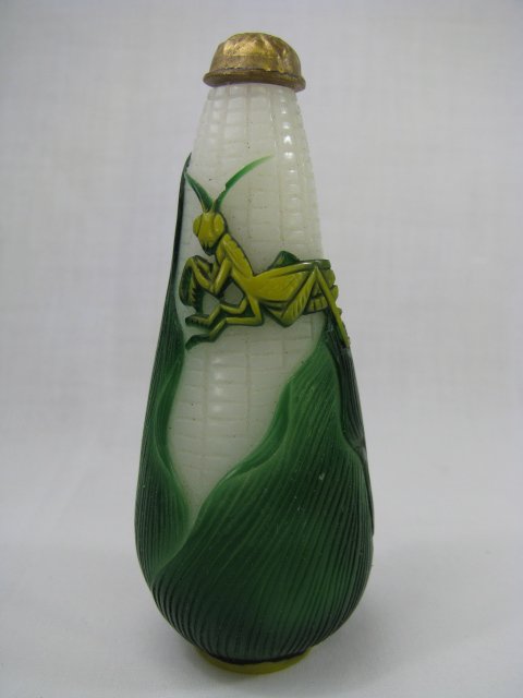 Appraisal: Chinese overlay glass snuff bottle in the form of an