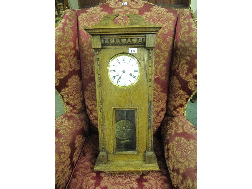 Appraisal: Oak cased wall clock