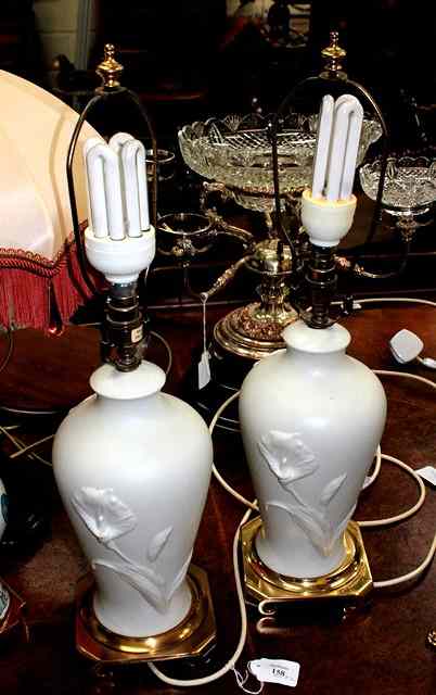 Appraisal: A PAIR OF WHITE PORCELAIN TABLE LAMPS of inverted baluster