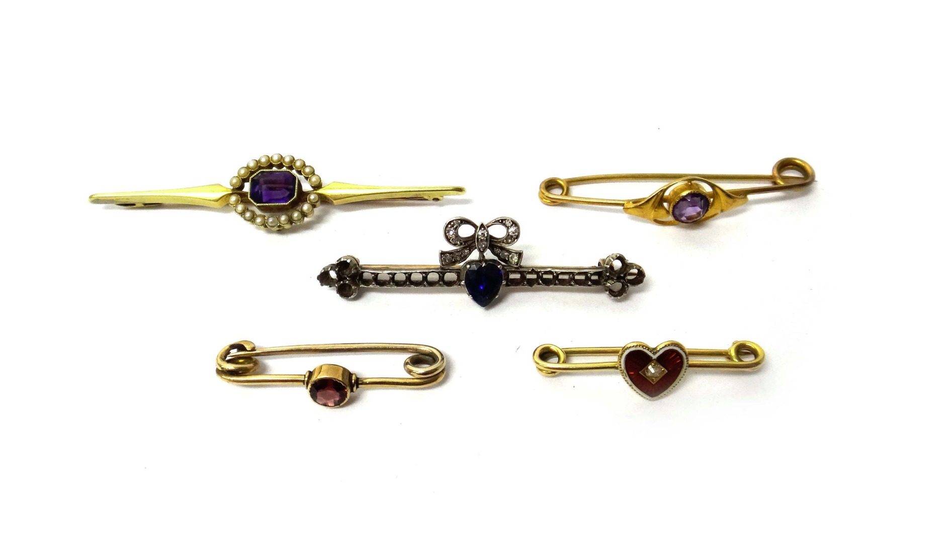 Appraisal: A gold amethyst and seed pearl set bar brooch detailed