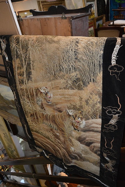 Appraisal: Japanese embroidered paneltwo tigers emerging from behind a bamboo clearing