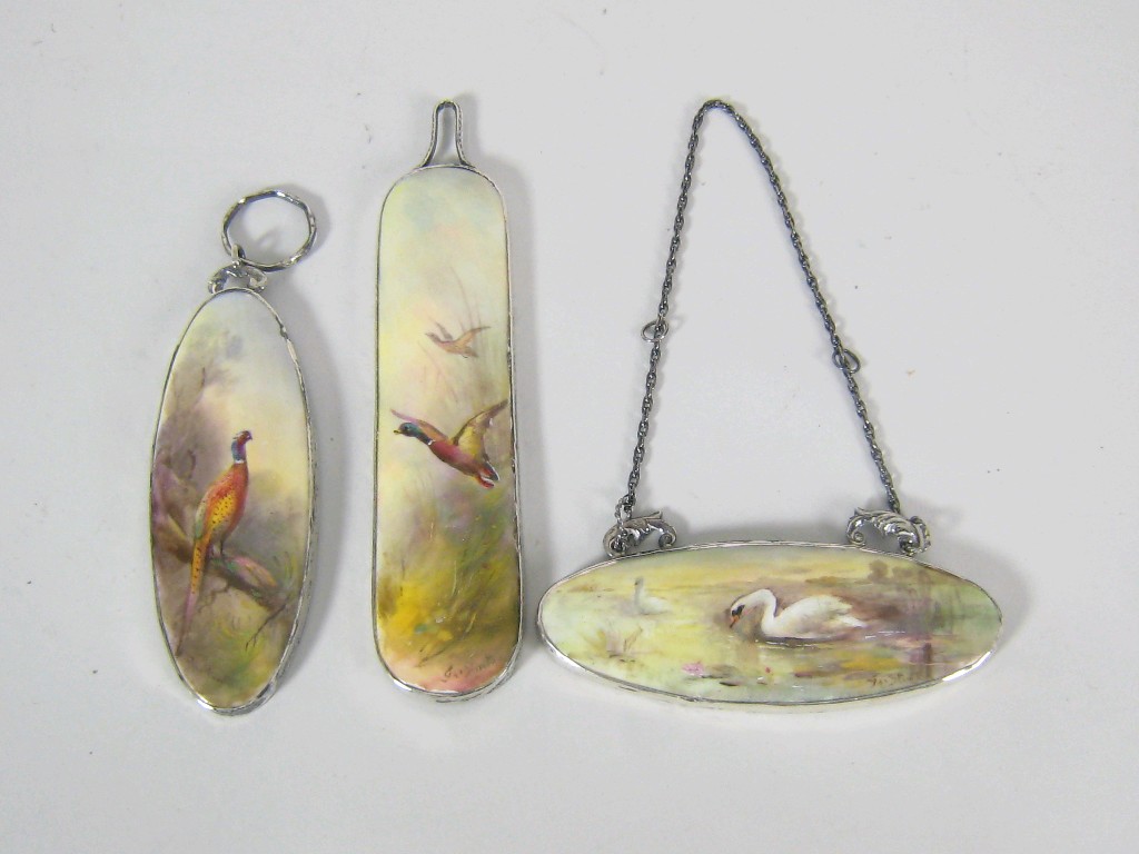 Appraisal: Three silver mounted Royal Worcester Pendants painted Duck Pheasant and