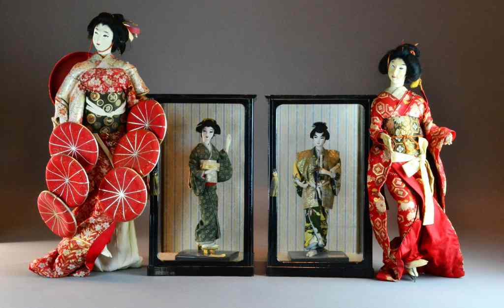 Appraisal: Japanese Porcelain And Cloth DollsTo include two in glass and