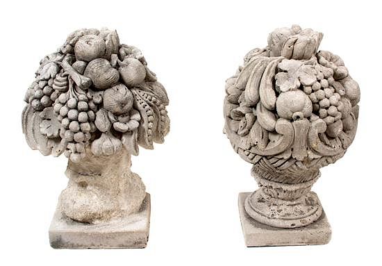 Appraisal: A Pair of Poured Cement Sculptures of Fruit Topiary Height