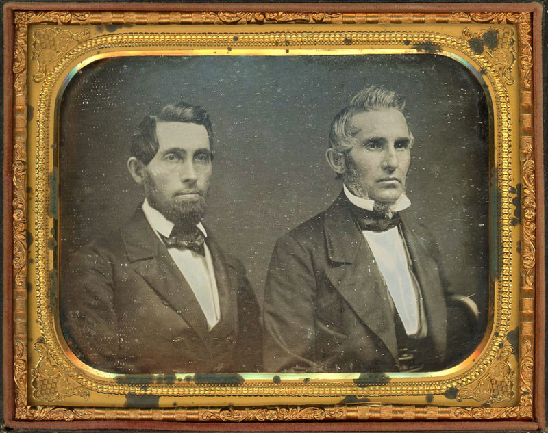 Appraisal: HALF PLATE DAGUERREOTYPE MEN AT AN ANGLE Two men angled