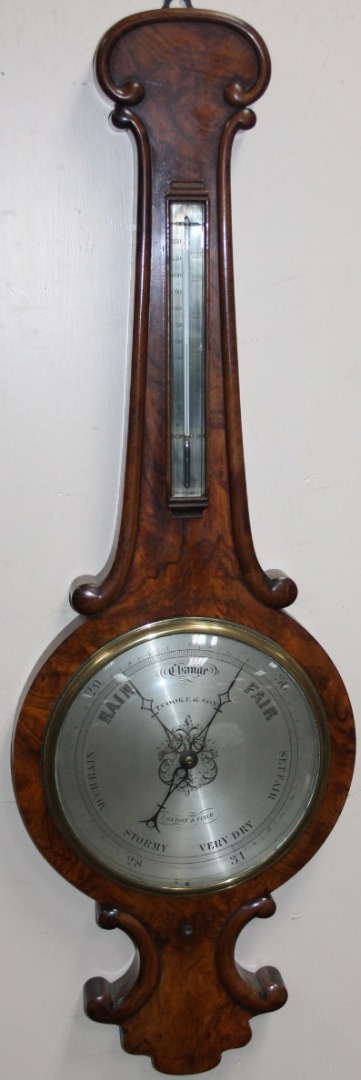 Appraisal: An early thC walnut cased two dial banjo barometer the